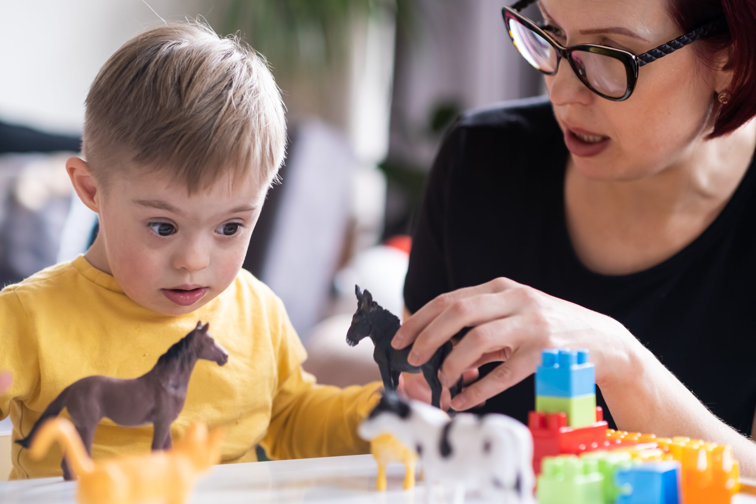 Child,With,Down,Syndrome,Exploring,Their,Creativity,And,Learning,With Syndrome